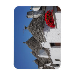Íman Flores de gerânio e casas de trulli em Alberobello
