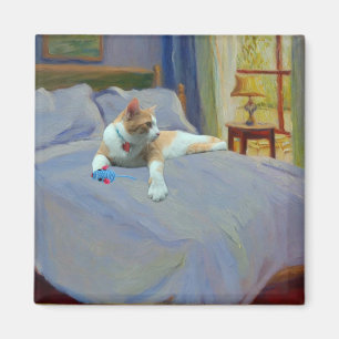 Íman Gato Laranja na cama