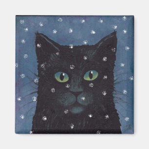 Íman gato preto na neve do inverno