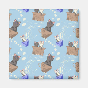 Íman Gatos na caixa e leite cai em azul