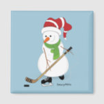 Íman Hockey Snowman Christmas<br><div class="desc">Snowman jogando hóquei no lago.</div>