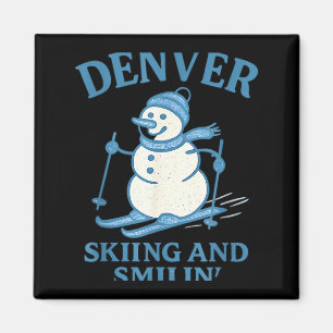 Íman Homem de neve sorridente e esquiando em Denver Col