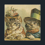 Íman Humor do vintage, gatos do noivo da noiva do<br><div class="desc">Imagem engraçada do humor da ilustração do vintage que caracteriza os gatos de gato malhado do Victorian que vestem chapéus. Um design do casamento do animal de estimação do amor e romance com uns noivos do gato. A noiva está vestindo um chapéu floral elegante da flor e o gato do...</div>