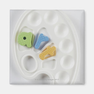 Íman Ideia de ângulo alto dos alfabetos em uma paleta