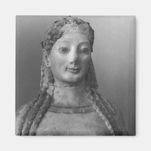 Íman Kore sabido como vestir-se de Kore peplos