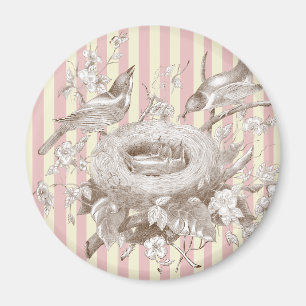 Íman La Petite Famille em fundo rosa e creme