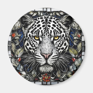 Íman Leopardo preto e branco cercado por flores