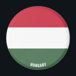Íman Magnet Patriótico Encantador de Bandeiras da Hungr<br><div class="desc">Hungria Flag Charming Patriotic Magnet com a bandeira da Hungria exibida em todo o ímã. O nome do país é sutilmente integrado no design na parte inferior. O texto é totalmente personalizável usando "Personalizar!" característica. Este belo Magnet da Hungria é o presente na moda para qualquer ocasião. © 2022 PaísesDoMundo...</div>