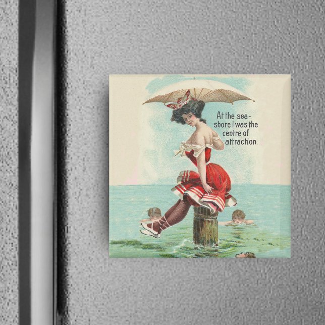 Íman Magneta Vitoriana de Bela Bala (Victorian lady in red bathing suit with parasol on log in ocean with admirers on square magnet.)