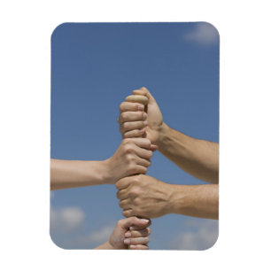 Íman Mãos da equipe no bastão