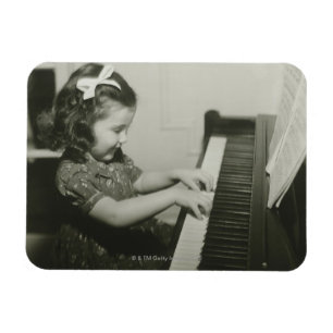 Íman Menina que joga o piano