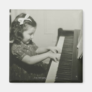 Íman Menina que joga o piano