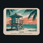 Íman Miami Florida Travel South Beach Minimalist Retro<br><div class="desc">Celebrate the vibrant character of Miami with this vintage South Beach skyline artwork. A colorful lifeguard tower rises above golden sands and turquoise waves, framed by lush tropical palms and glowing sunset skies. Inspired by retro travel posters, this pastel-toned illustration captures the laid-back atmosphere and timeless charm of Florida’s most...</div>