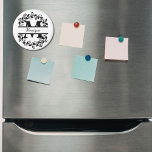 Íman Modern Black Floral Wreath Split Monogram "M"<br><div class="desc">This refined floral split monogram wreath design features a delicate botanical arrangement forming a graceful circular frame around a customizable monogram "M". The balanced composition highlights elegant leaves and floral accents that create a timeless and sophisticated look. This magnet is perfect for personalized gifts, wedding favors, home accessories, this design...</div>