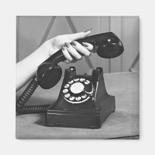 Íman Mulher que pegara o telefone próximo acima da mã