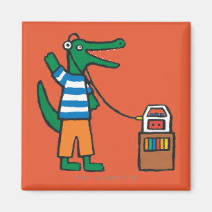 Íman O crocodilo legal escuta a música