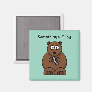 Íman O desenho animado do urso castanho, engraçado, de 