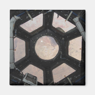 Íman O deserto de Sahara visível através das janelas