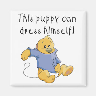 Íman O filhote de cachorro veste acima o camiseta e os