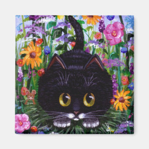 Íman O gato preto engraçado do smoking floresce