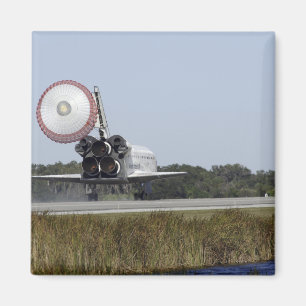 Íman O vaivém espacial Atlantis unfurls sua rampa de