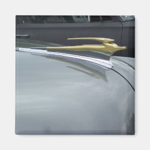 Íman ornamento dourado da capa do carro clássico