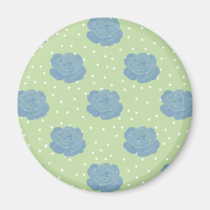 Íman Padrão de rosa azul no plano de fundo verde
