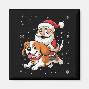 Íman Papai Noel montado em Cavalier King Charles Spanie