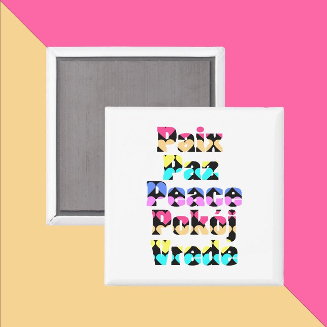 Íman Paz em muitas línguas corações brilhantes (A magnet that says peace in a variety of languages with a colorful heart pattern)