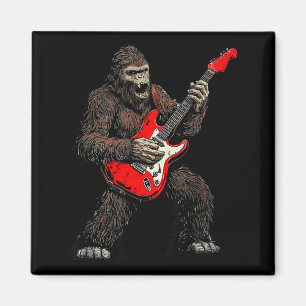 Íman Pé grande tocando guitarra banda de rock Sasquatch