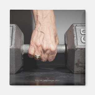 Íman Pesos de levantamento da mulher superior