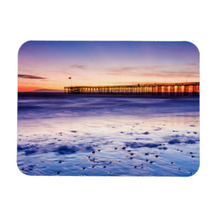 Íman Pôr do sol sobre o píer e a praia de Ventura