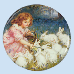Íman Rapariga alimentando coelhos