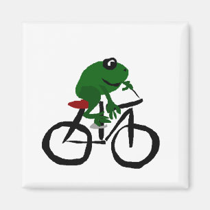Íman Sapo verde engraçado que monta uma bicicleta