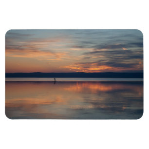 Íman Surfista a remar em terra