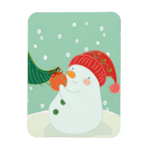 Íman Um boneco de neve que pendura um ornamento em uma