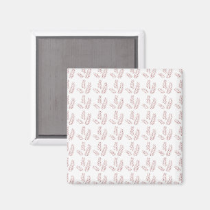 Íman um fundo branco com folhas rosa sobre ele