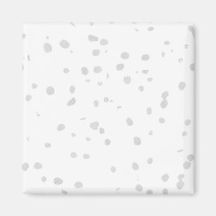 Íman um fundo branco com muitos pontos pequenos