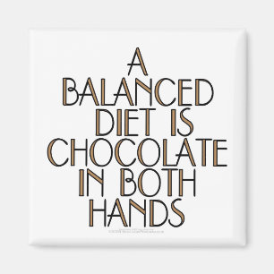 Íman Uma dieta equilibrada é chocolate em ambas as mã