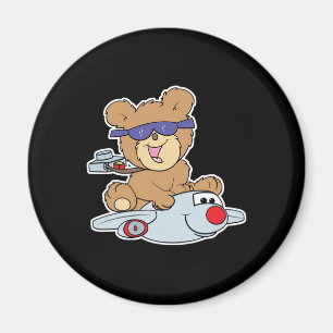 Íman urso de pelúcia de férias no avião
