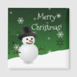 Íman Verdes Snowman Winter Scenery Christmas Magnet<br><div class="desc">Adicione um toque festivo à sua cozinha nesta temporada de festas com um imprevisível Snowman Green Winter Scenery Christmas Magnet. O design do ímã apresenta um boneco de neve feliz em uma cena de vento de neve contra um fundo verde adornado com flocos de neve de cor correspondente. Itens adicionais...</div>