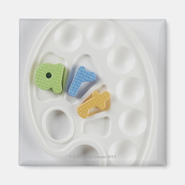 Íman Vista de alto ângulo dos alfabetos numa paleta (Frente)