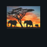 Impressão Em Tela Arte Afafricana De Elefante Sunset<br><div class="desc">Linda fotografia contemporânea do pôr do sol africano, e silhueta de árvore e elefante. Esta design é para o amante da natureza africana, animais, vida selvagem, elefantes, férias de safari ou cores brilhantes e vibrantes do verão. Clássico e elegante artigo de decoração para aqueles que adoram decorar o seu mestre...</div>