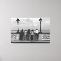 Contemplative Silhouettes at Historic Balustrade