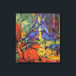 Impressão Em Tela Deer in the Forest II de Franz Marc, Vintage Art<br><div class="desc">Deer in the Forest II (1914) de Franz Marc é uma pintura de animais selvagens de arte e expressionismo vintage. Várias criaturas florestais, veados, um morcego e um filhote com manchas, deitados numa floresta cercada por árvores. Um fundo bonito, brilhante e colorido. Sobre o artista: Franz Marc (1880-1916) foi um...</div>