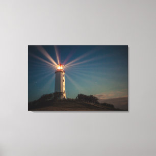 Impressão Em Tela Farol em um monte que brilha na noite