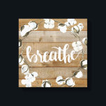 Impressão Em Tela Inspiração para o setor agrícola - Respire<br><div class="desc">Inspiração II de Jennifer Paxton Parker. Apresenta a palavra "Respirar" em cursivo ao lado de uma coroa de algodão e fundo de madeira.</div>