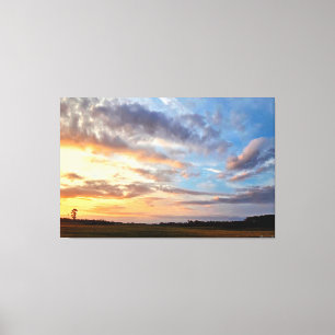 Impressão Em Tela Pôr do Sol Vibrante Sobre Campo Aberto 1