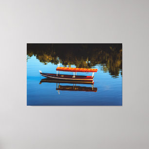 Impressão Em Tela Red Canoe Reflection on Still Blue Water