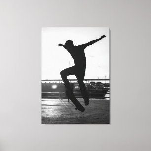Impressão Em Tela Silhouette of Skateboarder Performing Kickflip at